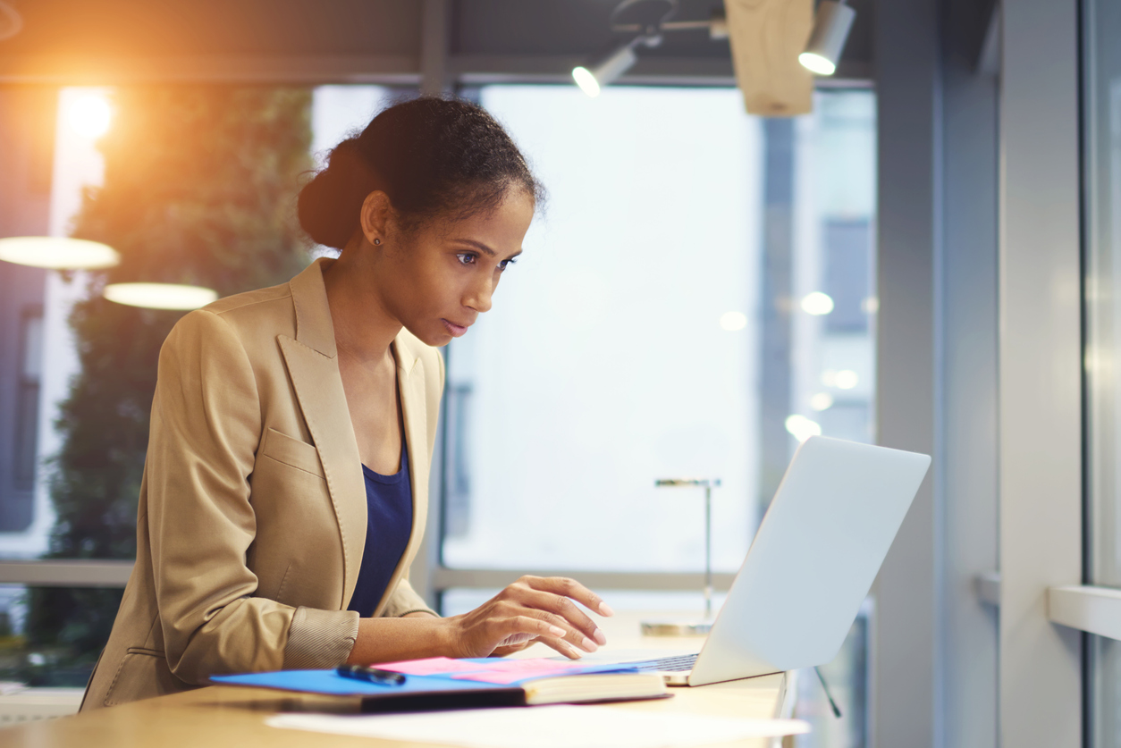 Woman preparing a revenue management report