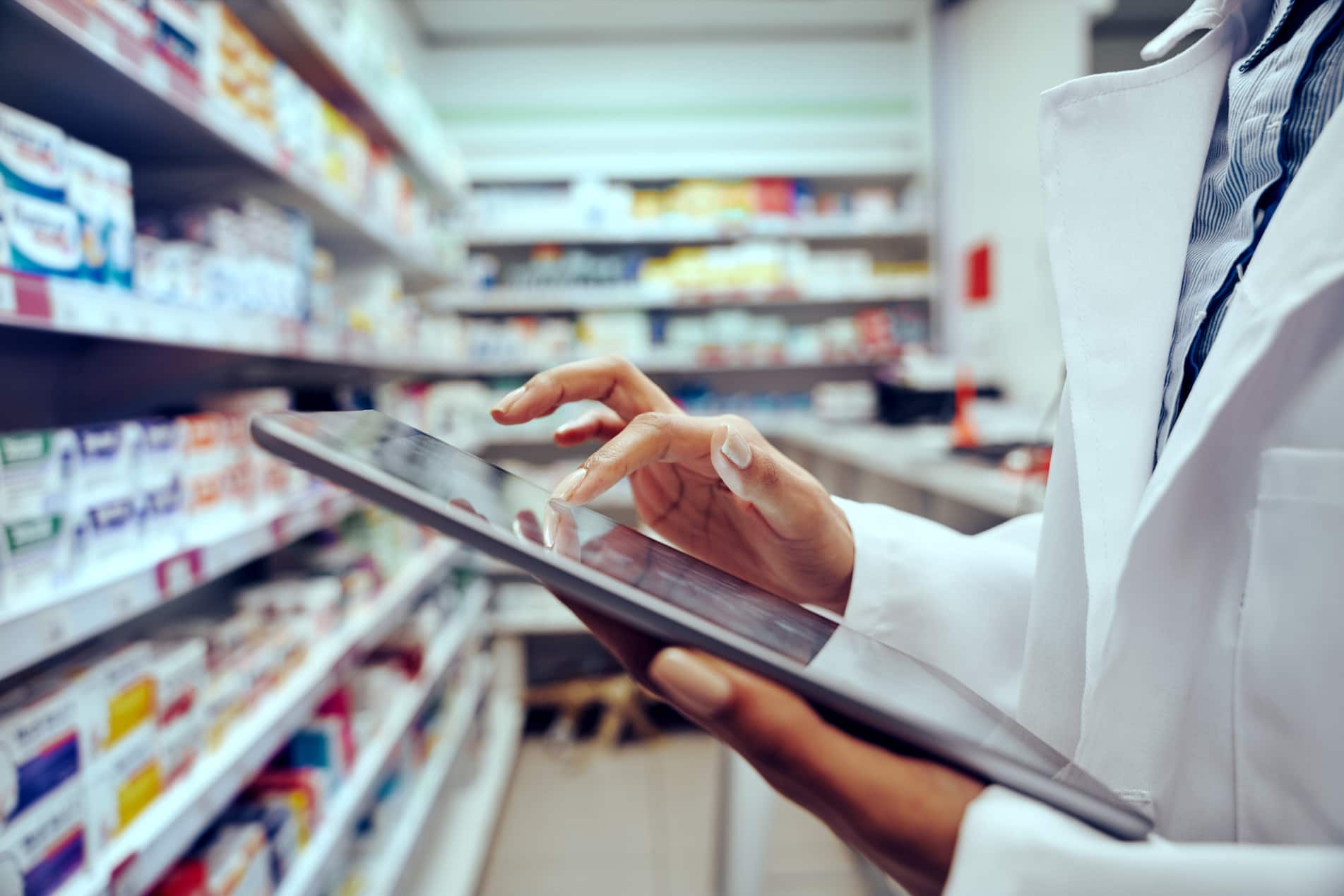 pharmacist using tablet
